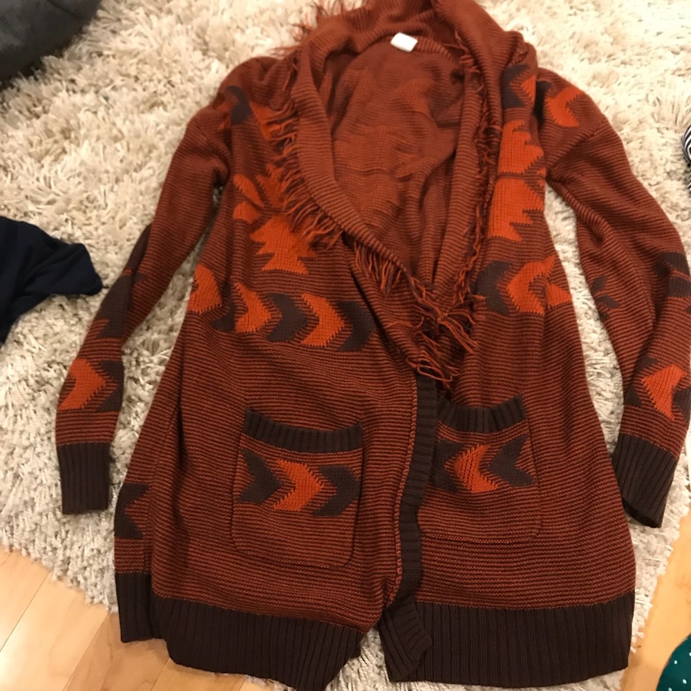 Long sweater with fringe